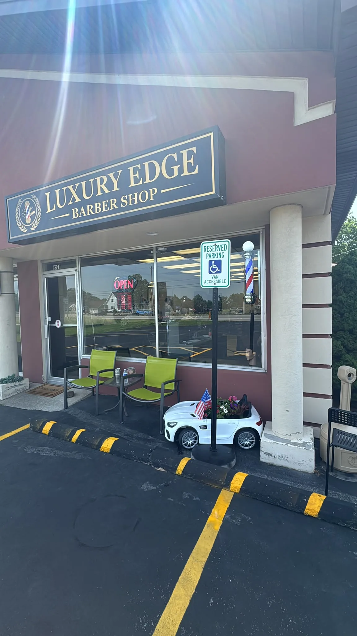Storefront view showing the luxury barber shop theme